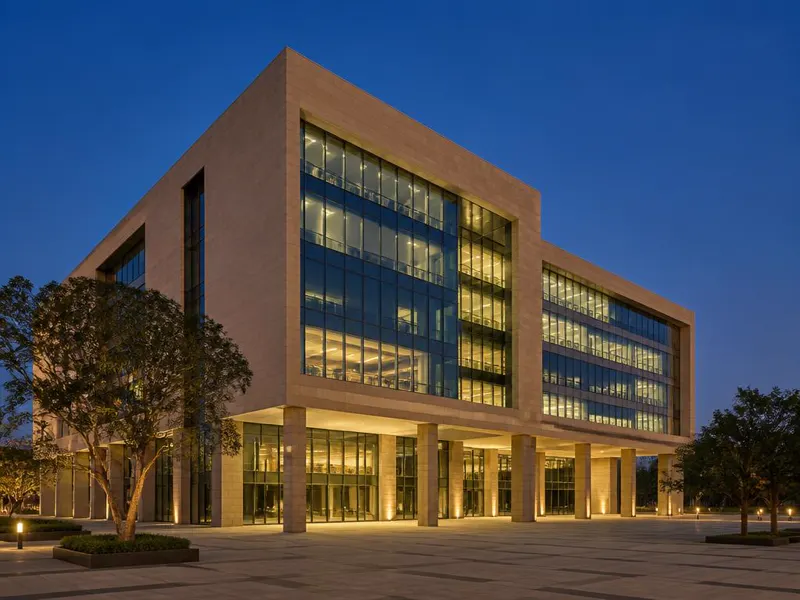 Modern commercial office building in the Tricity at dusk